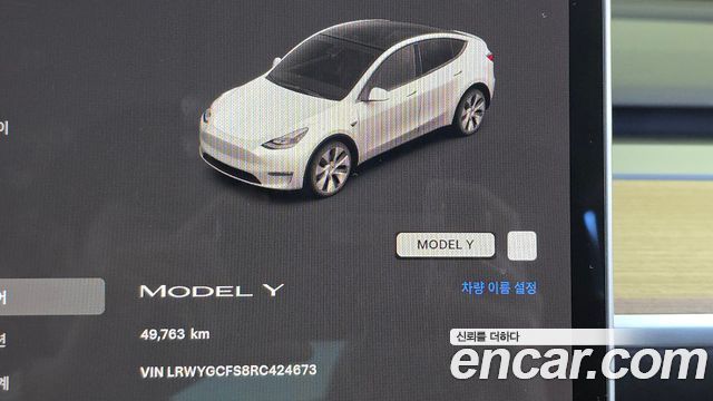 Tesla Model Y 2024 — photo 11