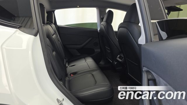 Tesla Model Y 2024 — photo 17