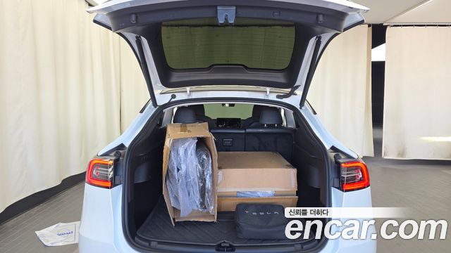 Tesla Model Y 2024 — photo 26