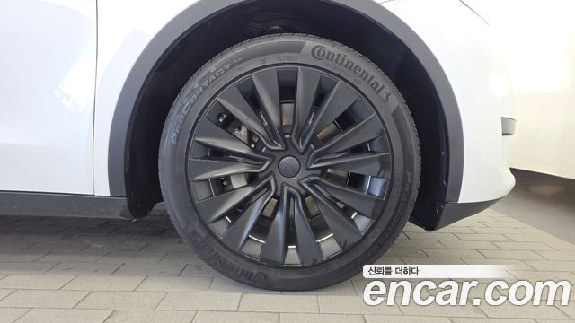 Tesla Model Y 2024 — photo 7