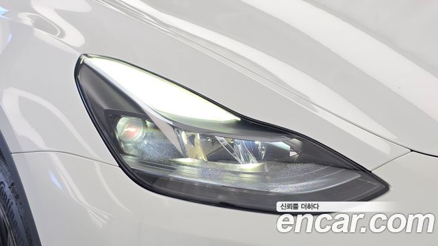 Tesla Model Y 2024 — photo 8