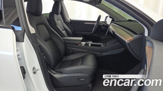 Tesla Model Y 2024 — photo 16