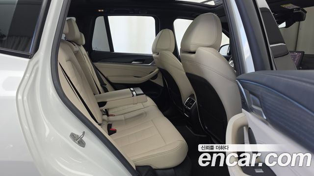 BMW iX3 2023 — photo 18
