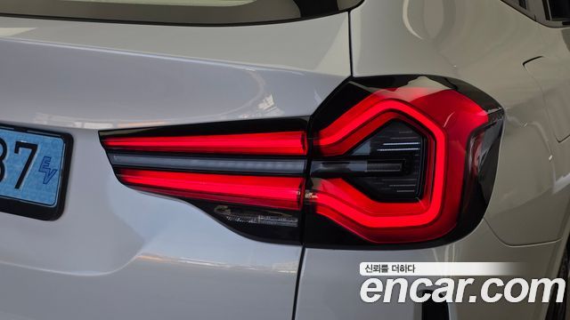 BMW iX3 2023 — photo 9
