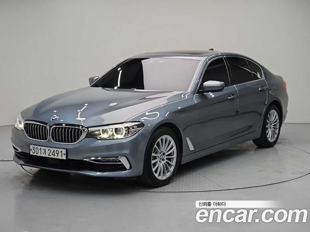 BMW 5-Series 2019 — photo 1