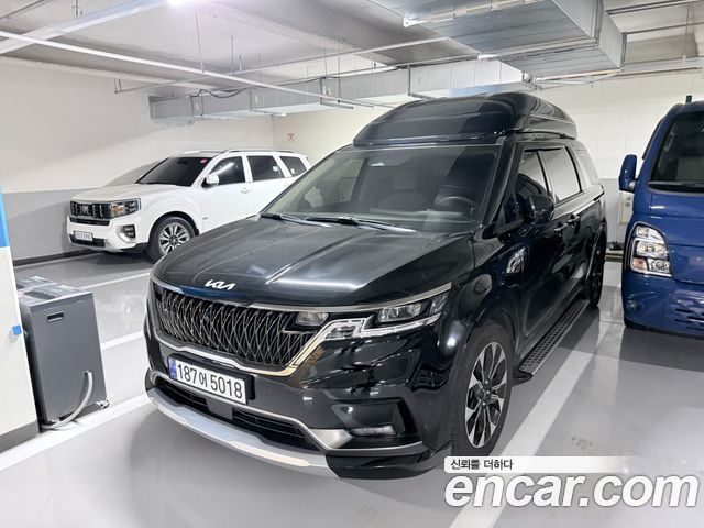 Kia Canival 2023 — photo 2