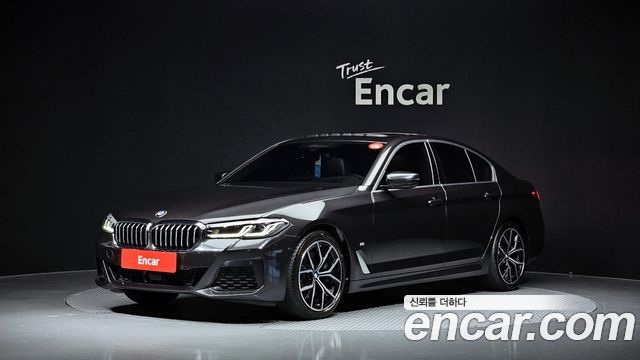 BMW 5-Series 2021 — photo 1