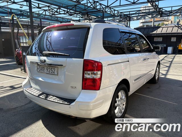 Kia Canival 2013 — photo 2