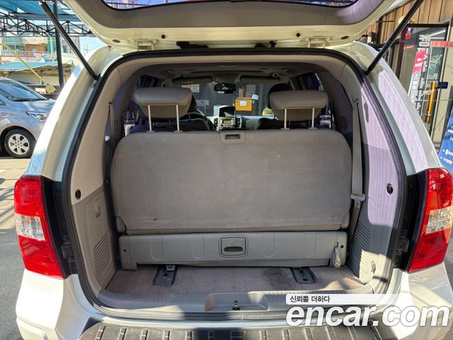 Kia Canival 2013 — photo 4