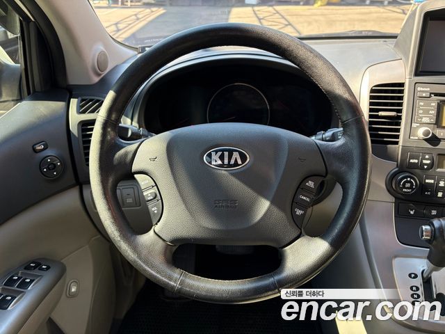 Kia Canival 2013 — photo 10