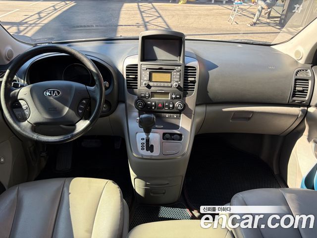 Kia Canival 2013 — photo 11