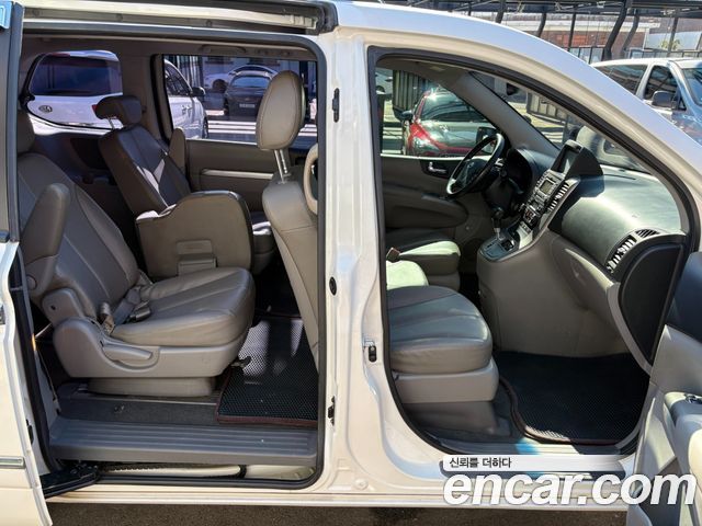 Kia Canival 2013 — photo 19