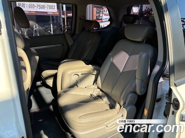 Kia Canival 2013 — photo 20
