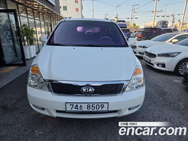 Kia Canival 2013 — photo 2