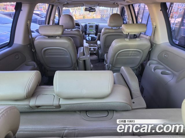 Kia Canival 2013 — photo 8