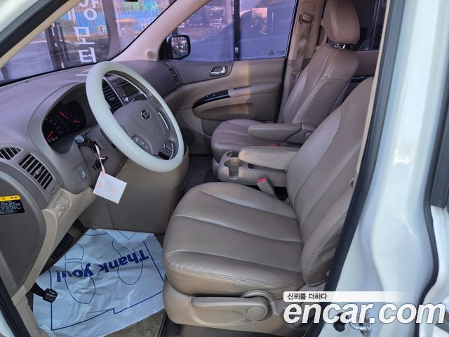 Kia Canival 2013 — photo 10