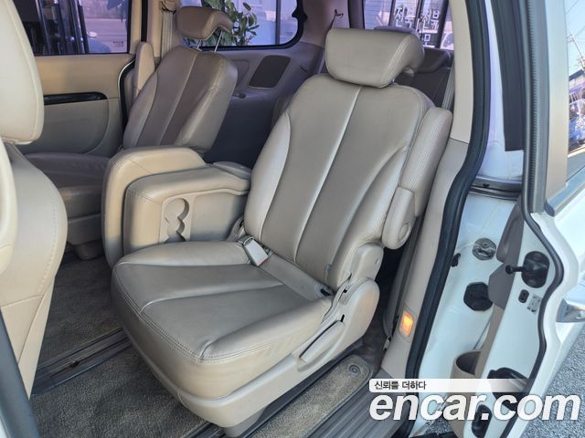 Kia Canival 2013 — photo 11