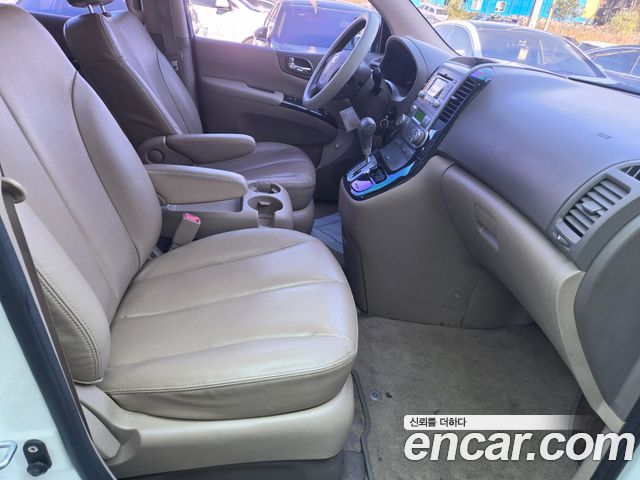 Kia Canival 2013 — photo 12