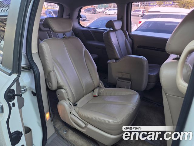 Kia Canival 2013 — photo 13