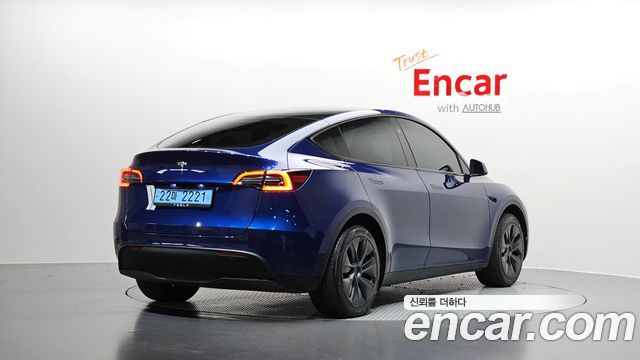 Tesla Model Y 2025 — photo 2