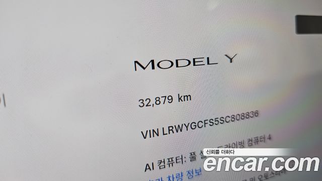 Tesla Model Y 2025 — photo 11