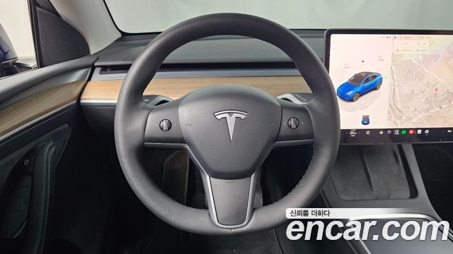 Tesla Model Y 2025 — photo 19