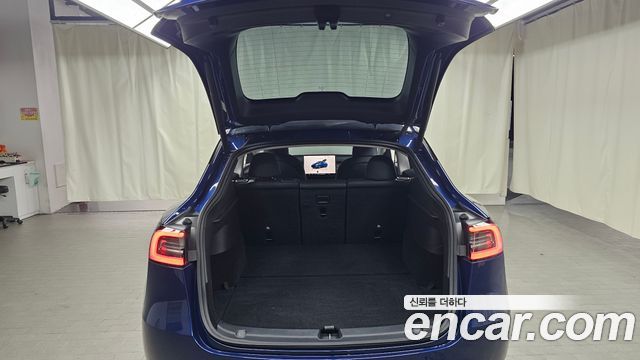 Tesla Model Y 2025 — photo 24