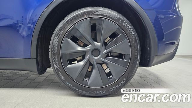 Tesla Model Y 2025 — photo 7