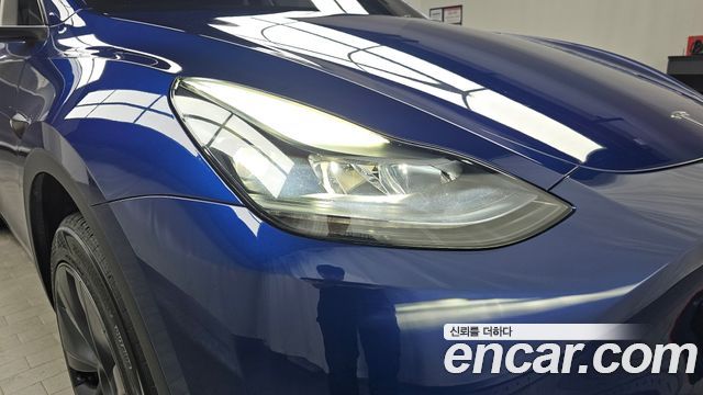 Tesla Model Y 2025 — photo 8