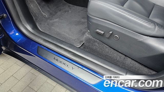 Tesla Model Y 2025 — photo 27
