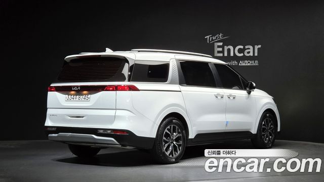 Kia Canival 2023 — photo 2