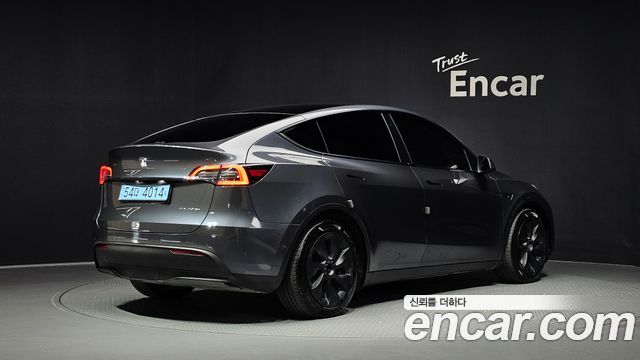 Tesla Model Y 2022 — photo 2