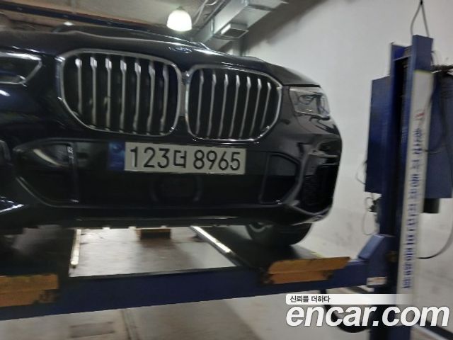 BMW X5 2022 — photo 1