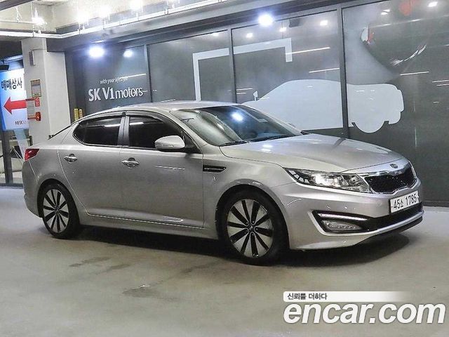 Kia K5 2012 — photo 1