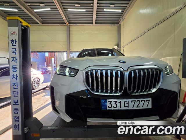 BMW X5 2024 — photo 1