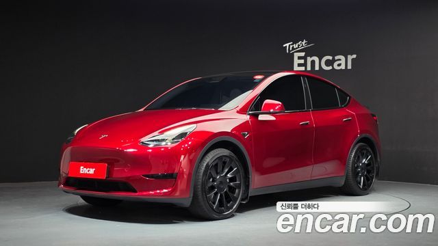 Tesla Model Y 2024 — photo 1