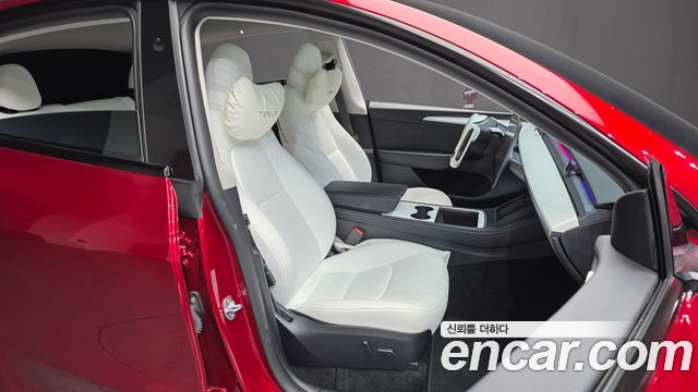 Tesla Model Y 2024 — photo 16