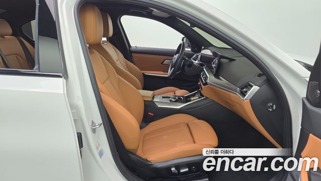 BMW 3-Series 2024 — photo 16