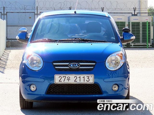 Kia morning 2009 — photo 1