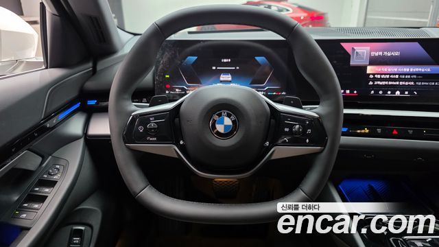 BMW 5-Series 2024 — photo 16