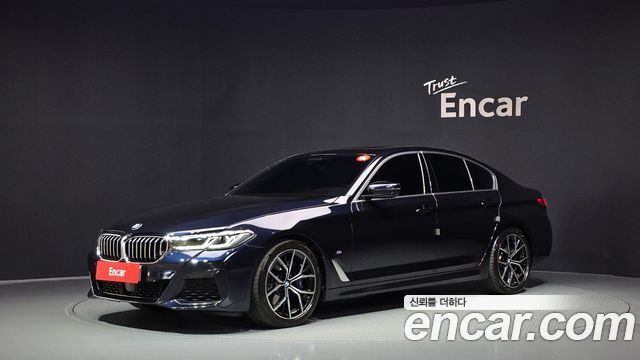 BMW 5-Series 2023 — photo 1
