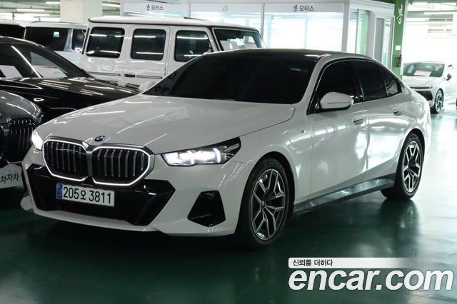 BMW 5-Series 2024 — photo 1