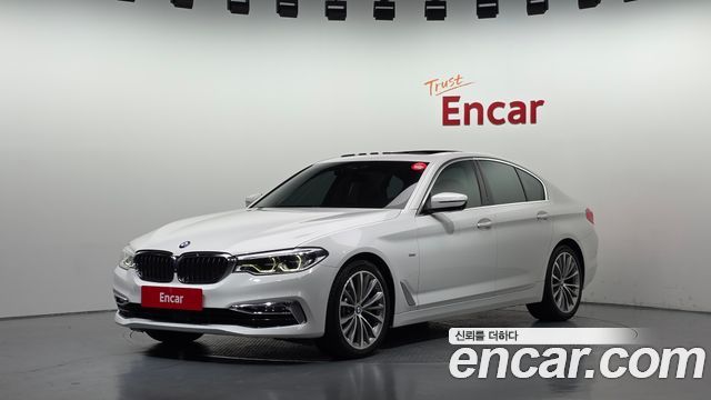 BMW 5-Series 2018 — photo 1