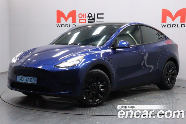 Tesla Model Y 2023 — photo 2
