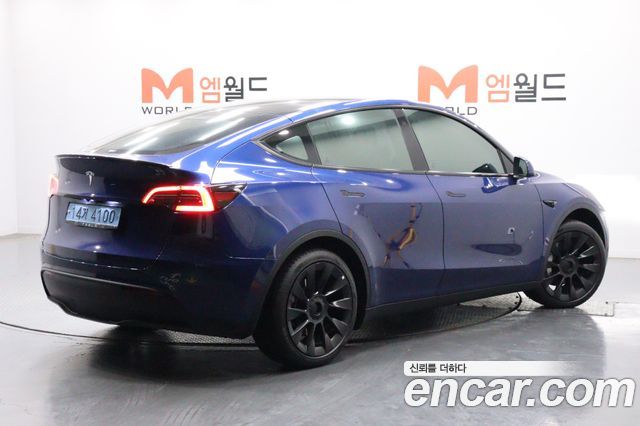 Tesla Model Y 2023 — photo 4