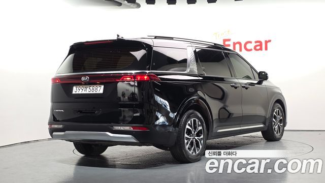Kia Canival 2021 — photo 2