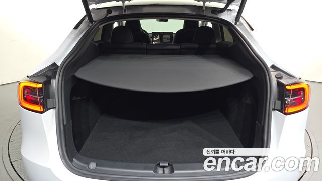 Tesla Model Y 2023 — photo 23