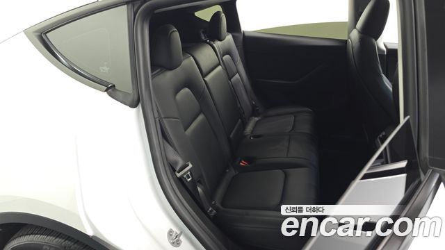 Tesla Model Y 2023 — photo 16