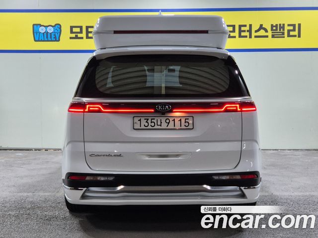 Kia Canival 2021 — photo 4