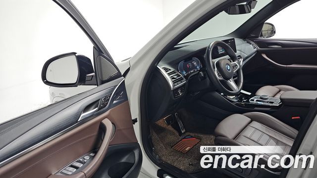 BMW iX3 2024 — photo 13